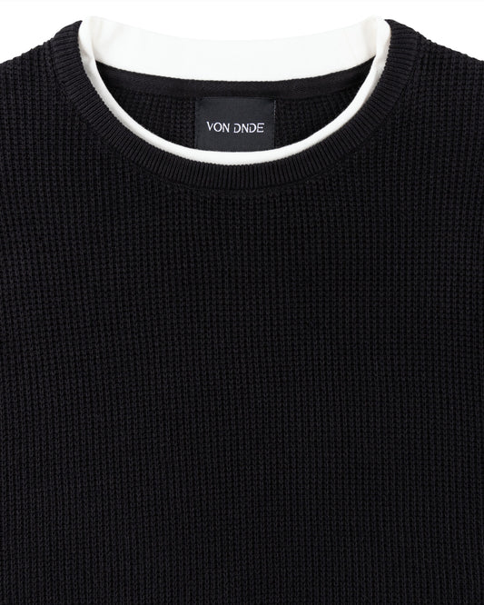 Schwarze Pullover